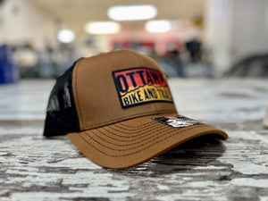 First In Apparel Shop Merch Caramel Ottawa Bike and Trail Logo Trucker Hat